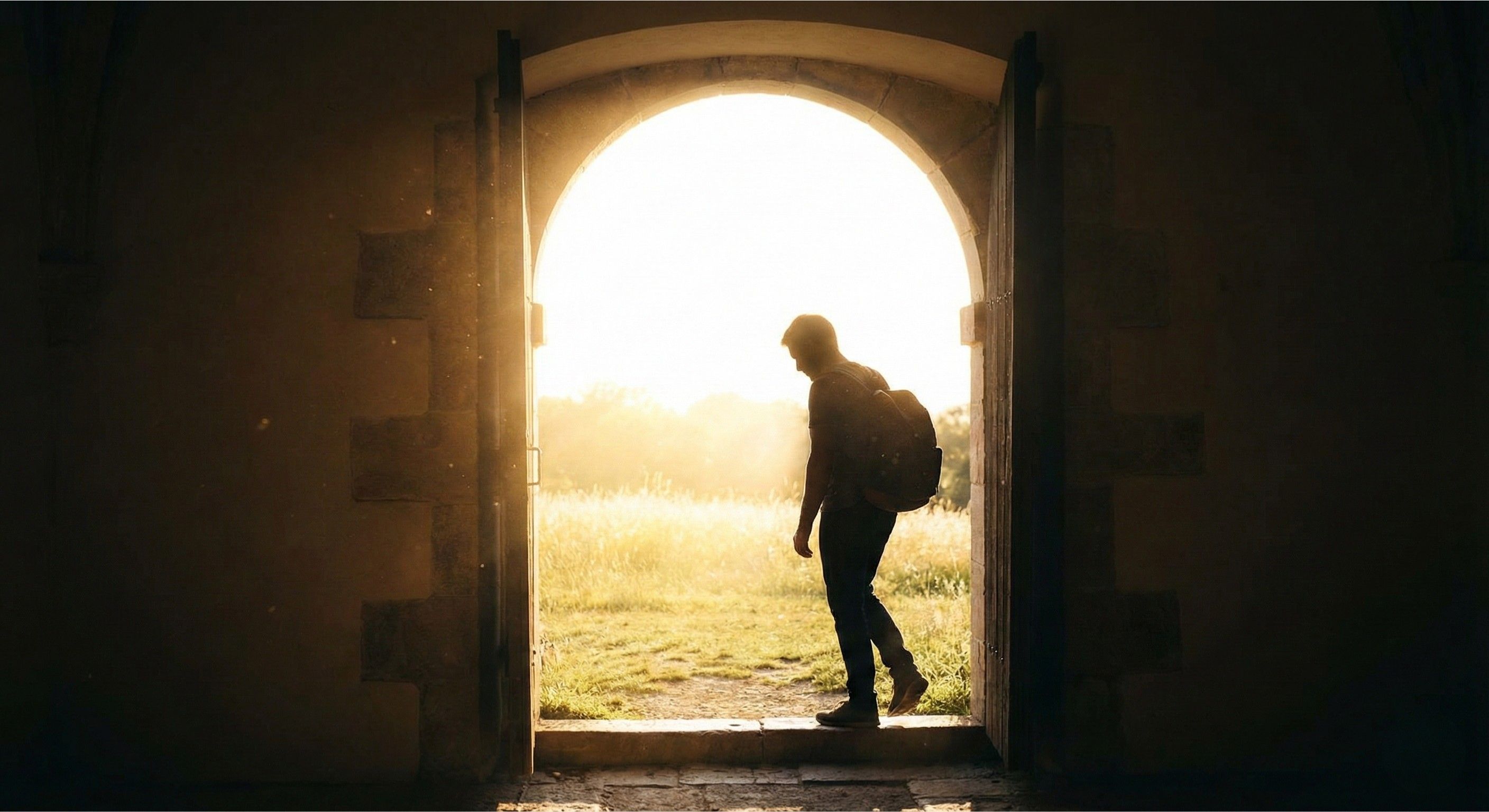 Person stepping from shadow into light